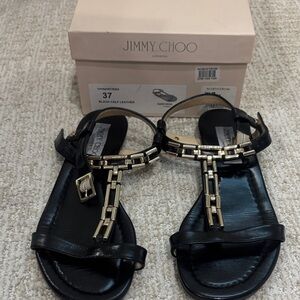 Jimmy Choo Black and Gold Sandals